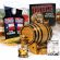 Texas Sweet Corn Whiskey making kit with oak aging barrel, premium essence packets, corn and grain ingredients, glass of whiskey, and complete home infusion system.