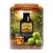 Premium Apple Whiskey Essence 20ml packet with fresh green apples and glass of apple flavored whiskey in an apple orchard.