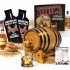American Single Malt Whiskey Making Kit with oak barrel, premium essence packets, glass of whiskey, barley grains and complete home aging accessories.